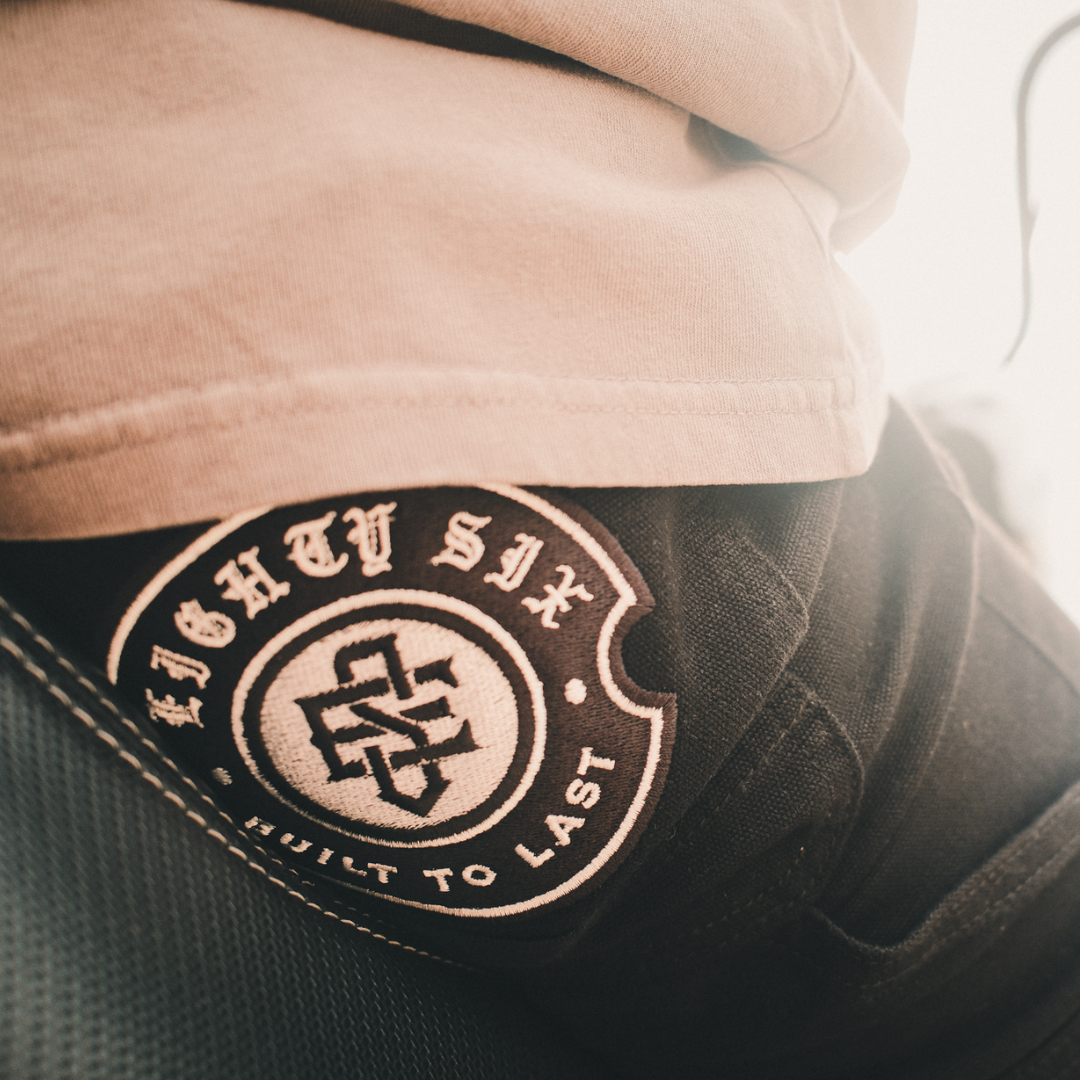 Crest Canvas Trousers
