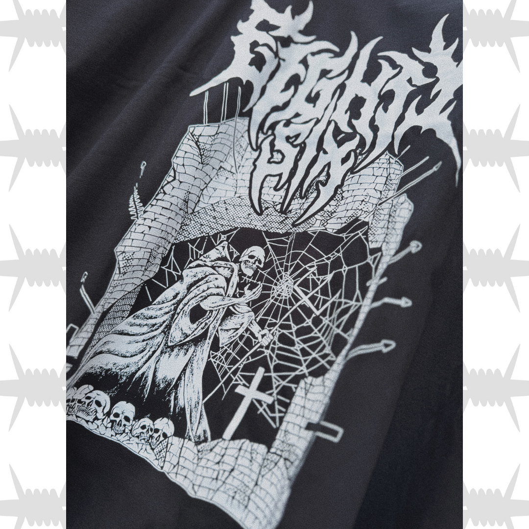 lose up of the eightysix castle hoodie artwork with white death metal script eightysix logo and demonic skeleton raiding a castle artwork