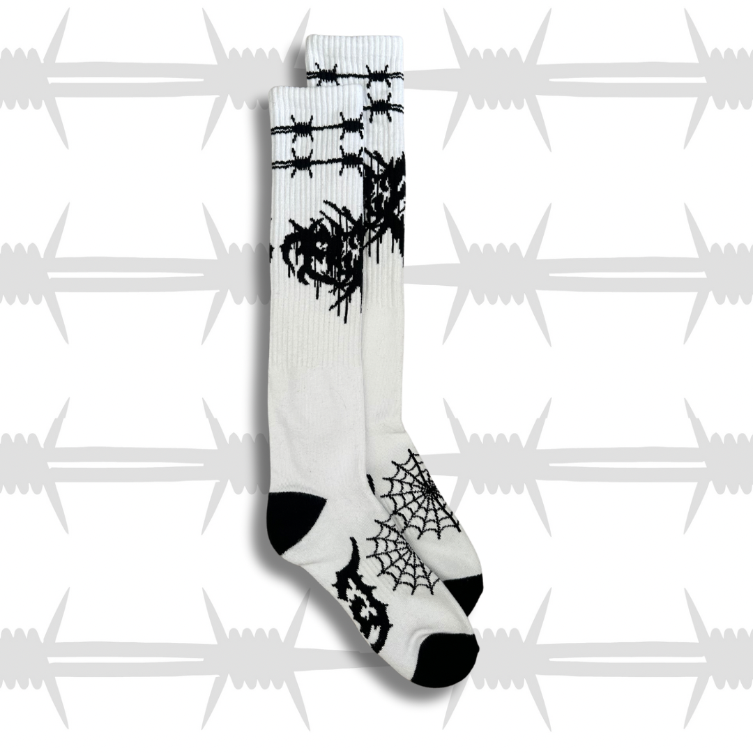 eightysix and og socks collaberation metal knee high socks in white with black barbed wire, cobwebs and death metal eightysix logo