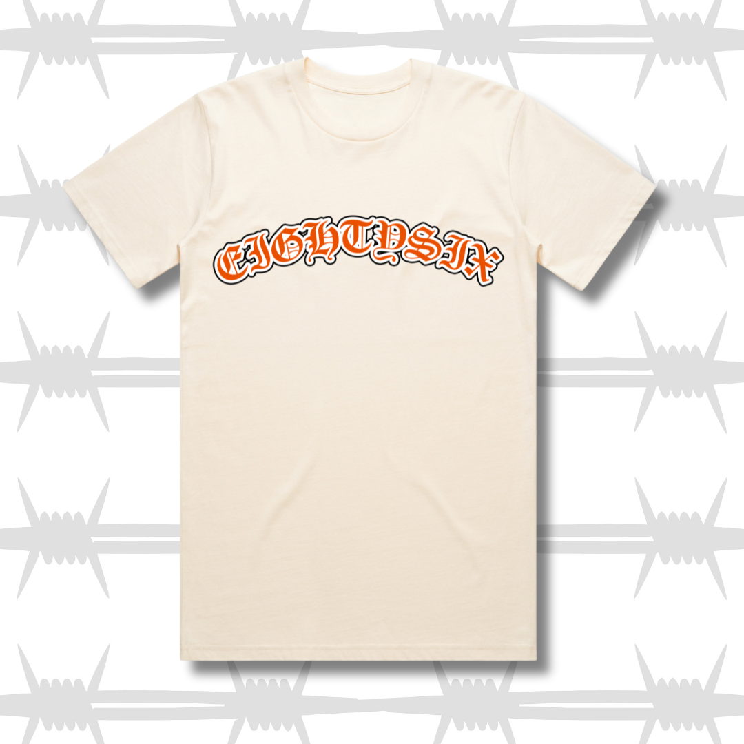 Old English Tattoo script t-shirt in ecru with orange script