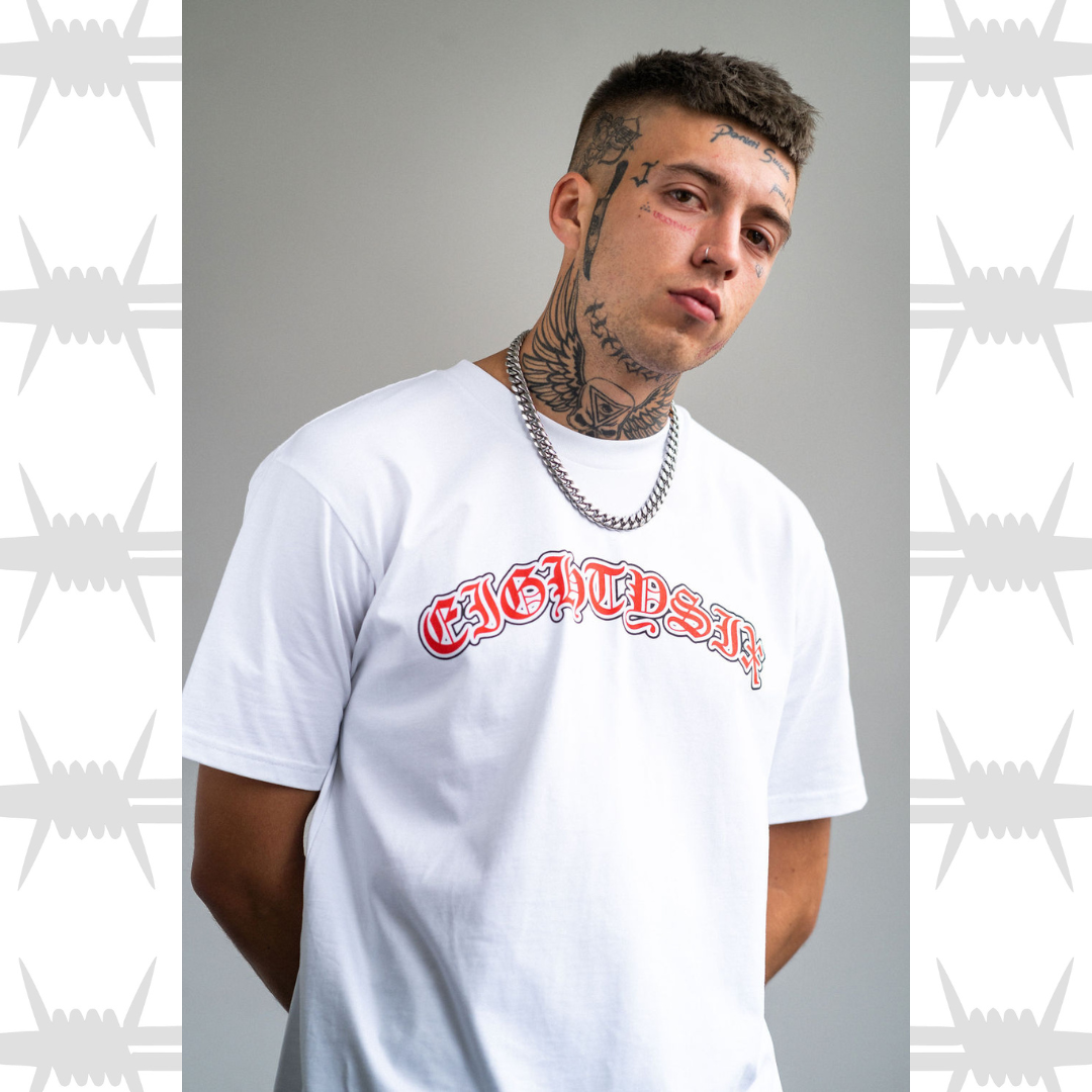 Old English tattoo Script t-shirt in white worn by tattoo alternative model