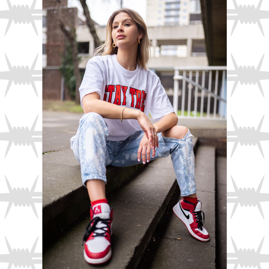 Stay True Varsity t-shirt graphic t-shirt in white worn by female alternative lifestyle streetwear model