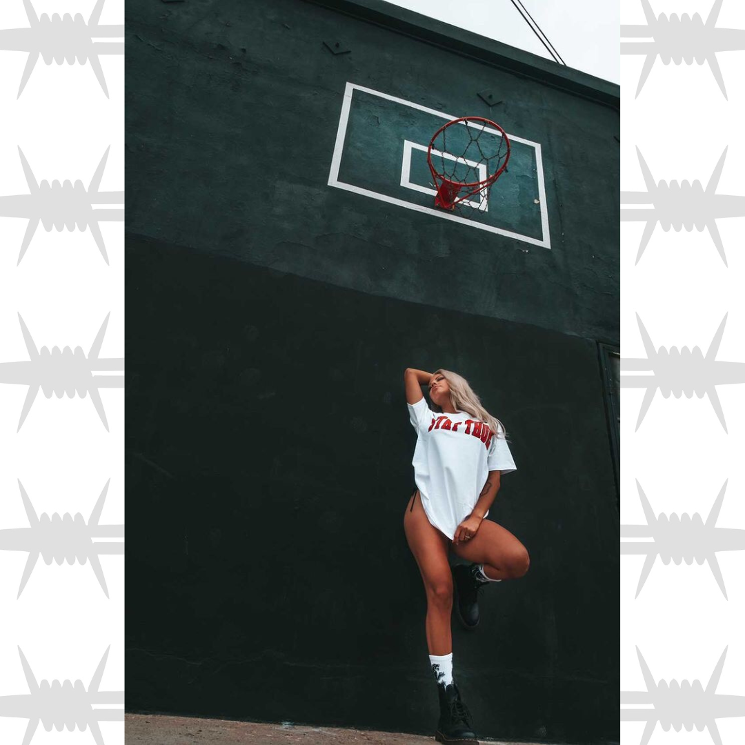 Stay True varsity t-shirt worn by alternative streetwear model