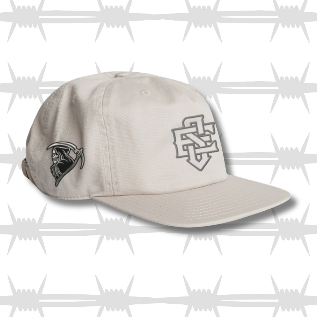 White baseball cap with embroidered ES logo and reaper design in grey