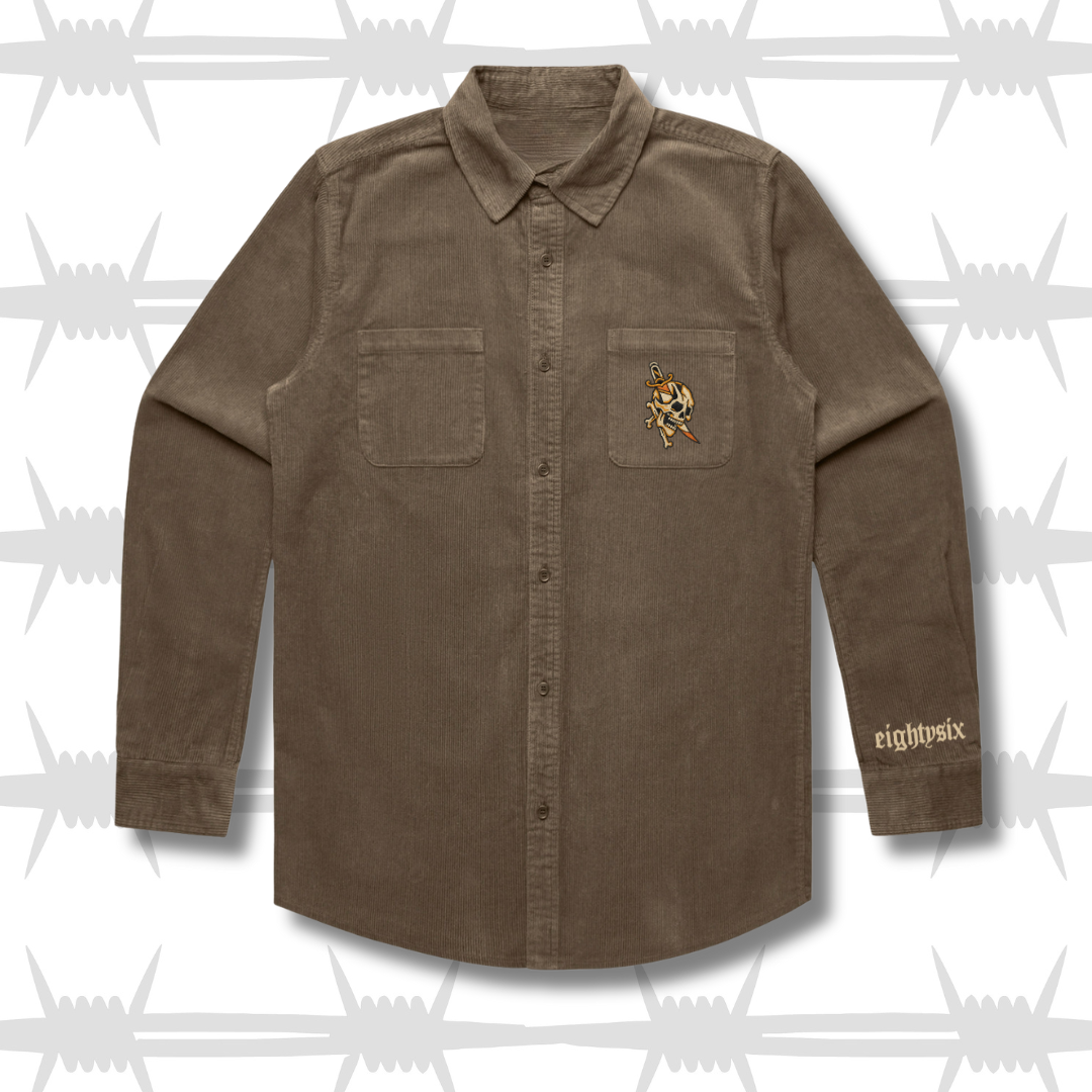 Walnut brown workwear shirt with a tattoo inspired dagger and skull design on the pocket