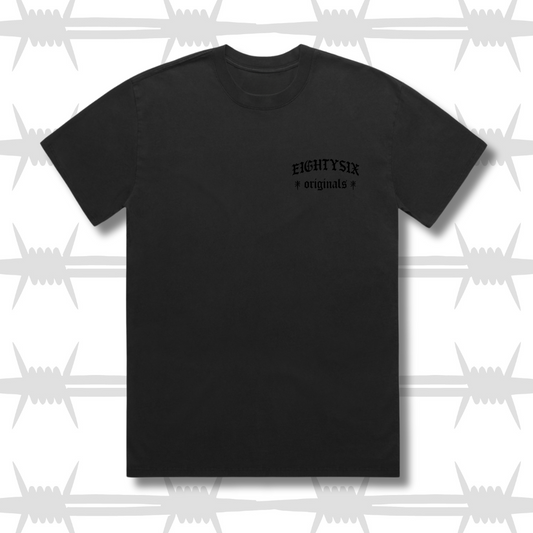 The eightysix originals limited edition black on black t-shirt. This design features a faded black t-shirt with an embroidered black eightysix originals logo on the left breast.