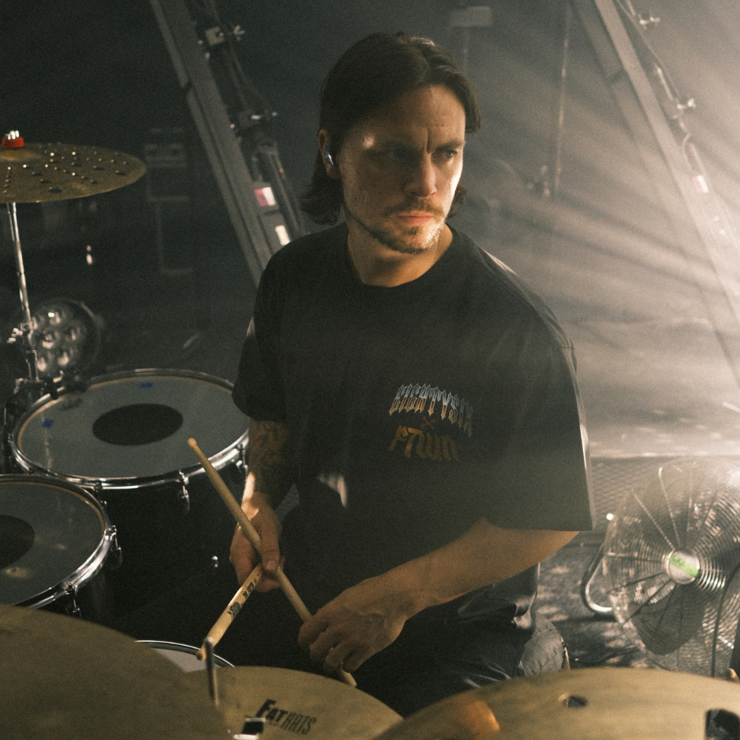 Eightysix x Flinttown t-shirt from the front worn by the drummer of You Me At Six Dan Flint while the band played a gig