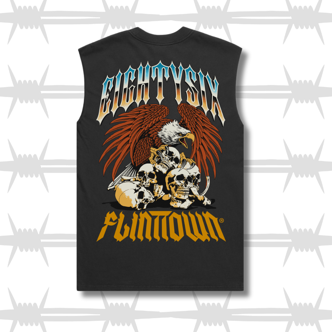 eightysix x flnttown tank back image with eightysix logo in a tattooed chrome style, an eagle protecting skulls in a tattoo style and the flinttown full logo in orange
