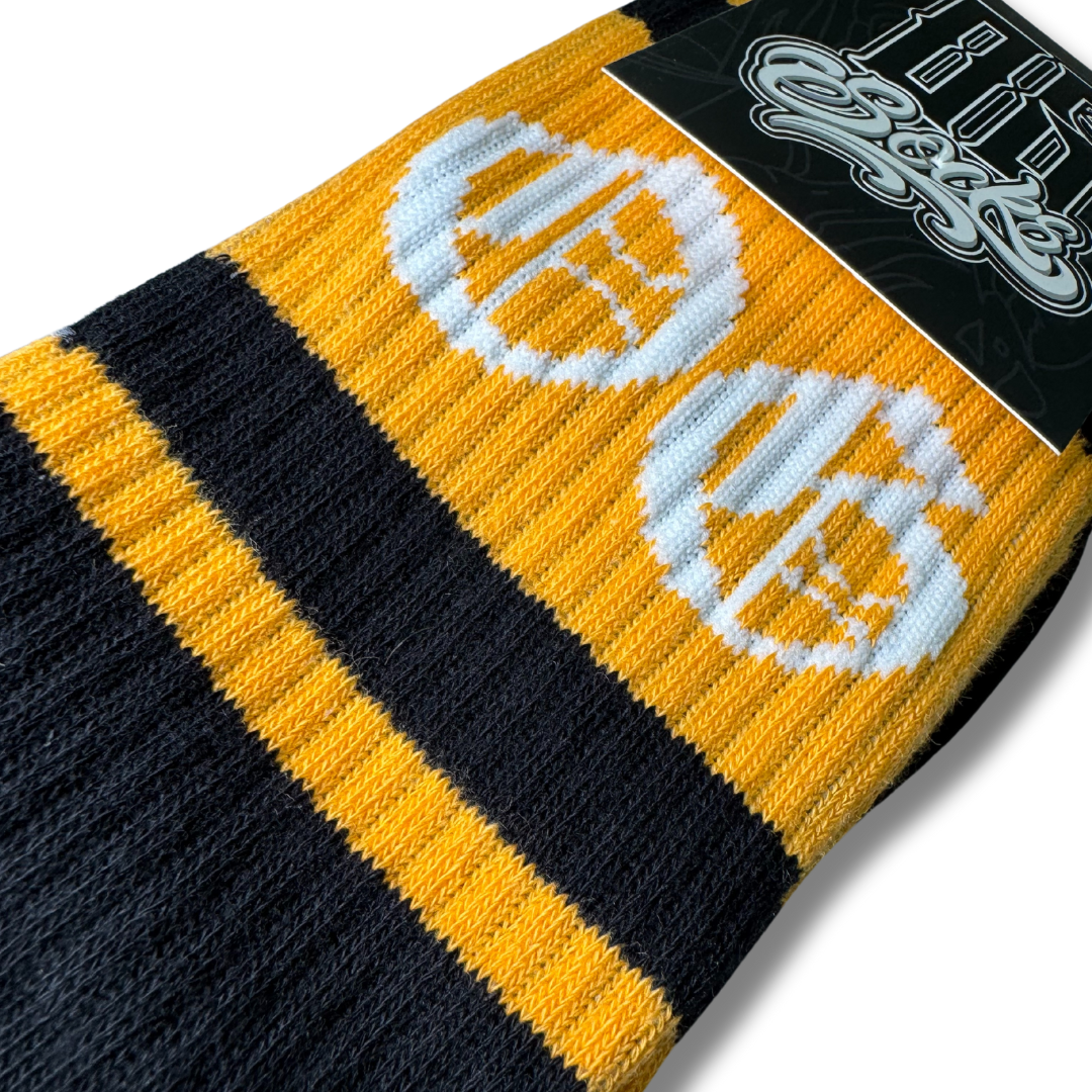 black OG sock with tangerine stripe and OG logo