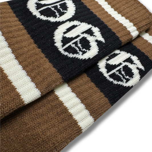 Mocha coloured OG socks with black and white stripes and white OG logo.