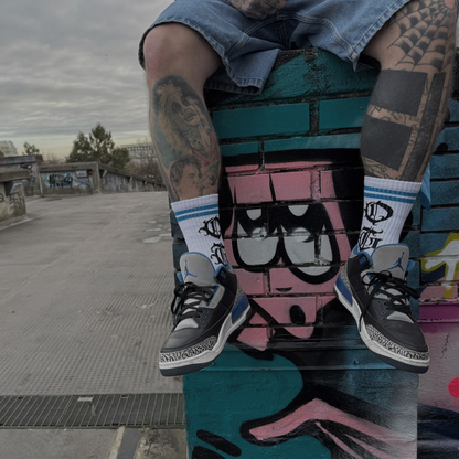 White og sock with two blue stripes and OG logo written in old english