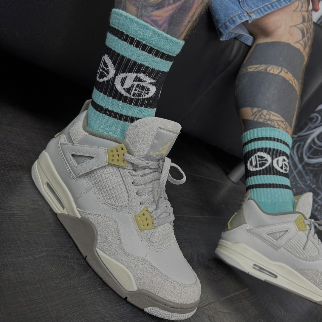 Spearmint OG sock with black stripes and a white OG logo