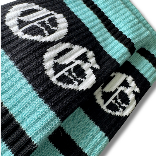 Spearmint OG sock with black stripes and a white OG logo