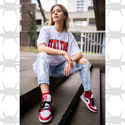 Stay True Varsity t-shirt graphic t-shirt in white worn by female alternative lifestyle streetwear model