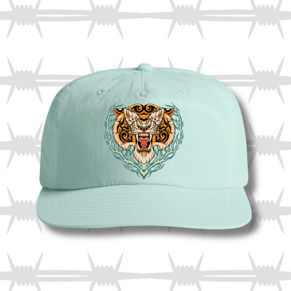 seafoam coloured surf cap with traditional tattoo style tiger design