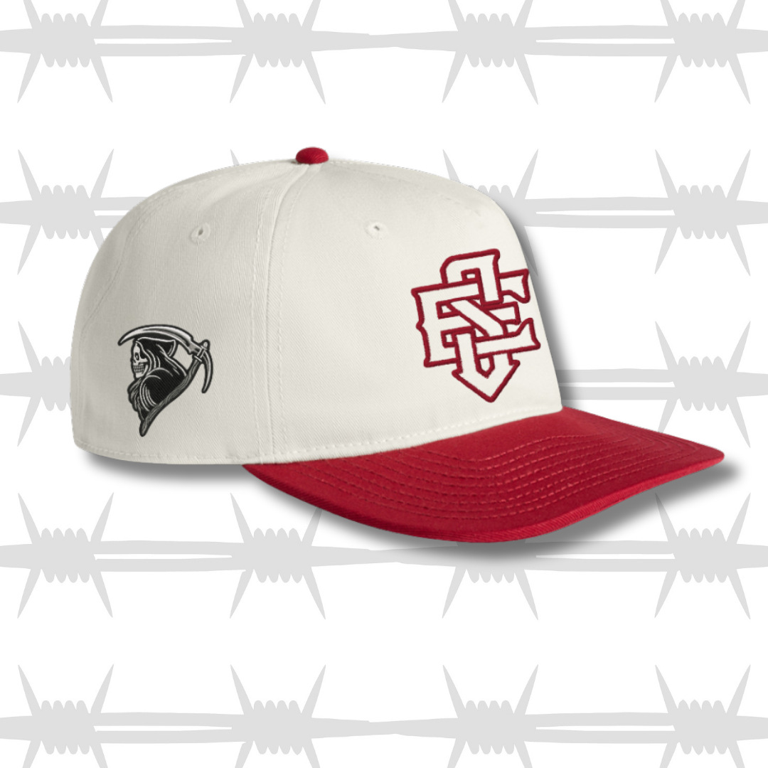 Red and white two tone cap with embroidered ES logo and tattoo inspired reaper design on the side